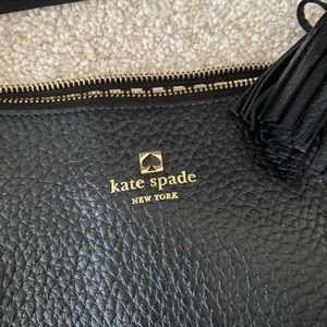 Black leather shoulder bag by Kate Spade. Gently used, no wear.